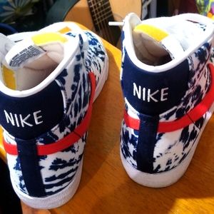 White blue nike high tops